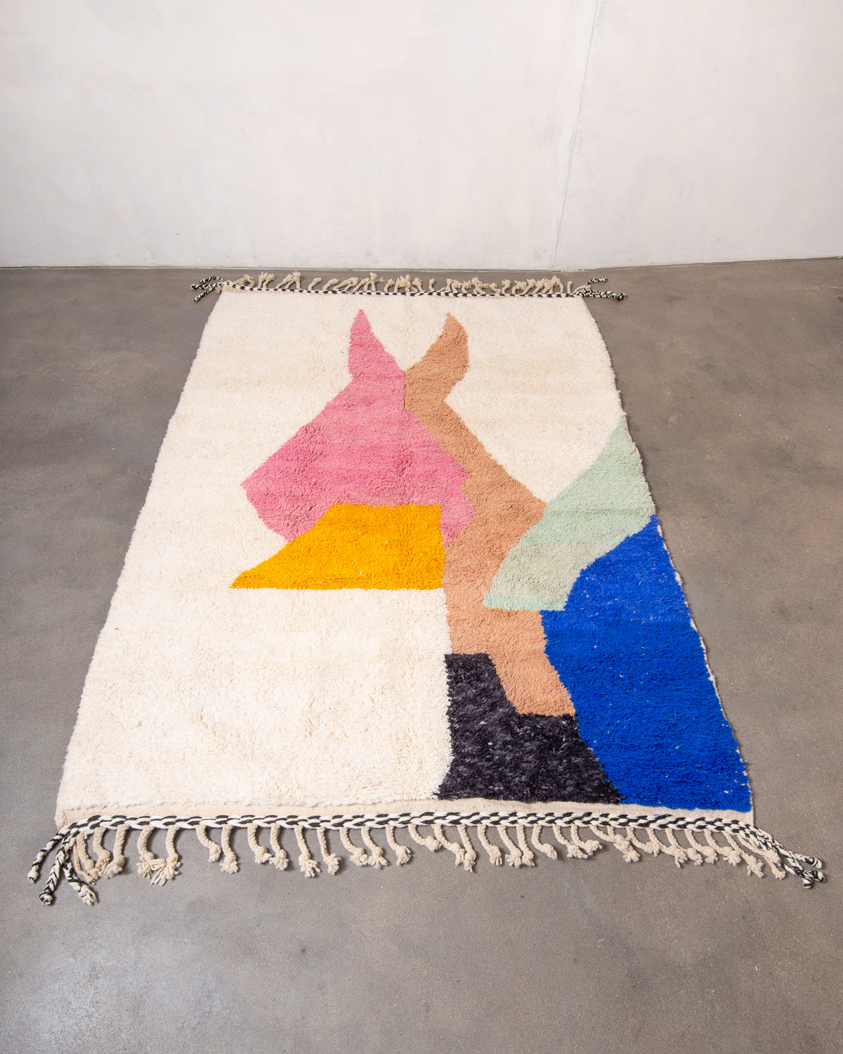 Modern, designer, handcrafted Berber rug from Morocco. Beniourain carpet with beautiful colours and patterns and fluffy wool texture.